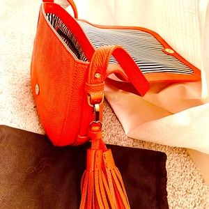 Beautiful coral Kate Spade cross-body bag!